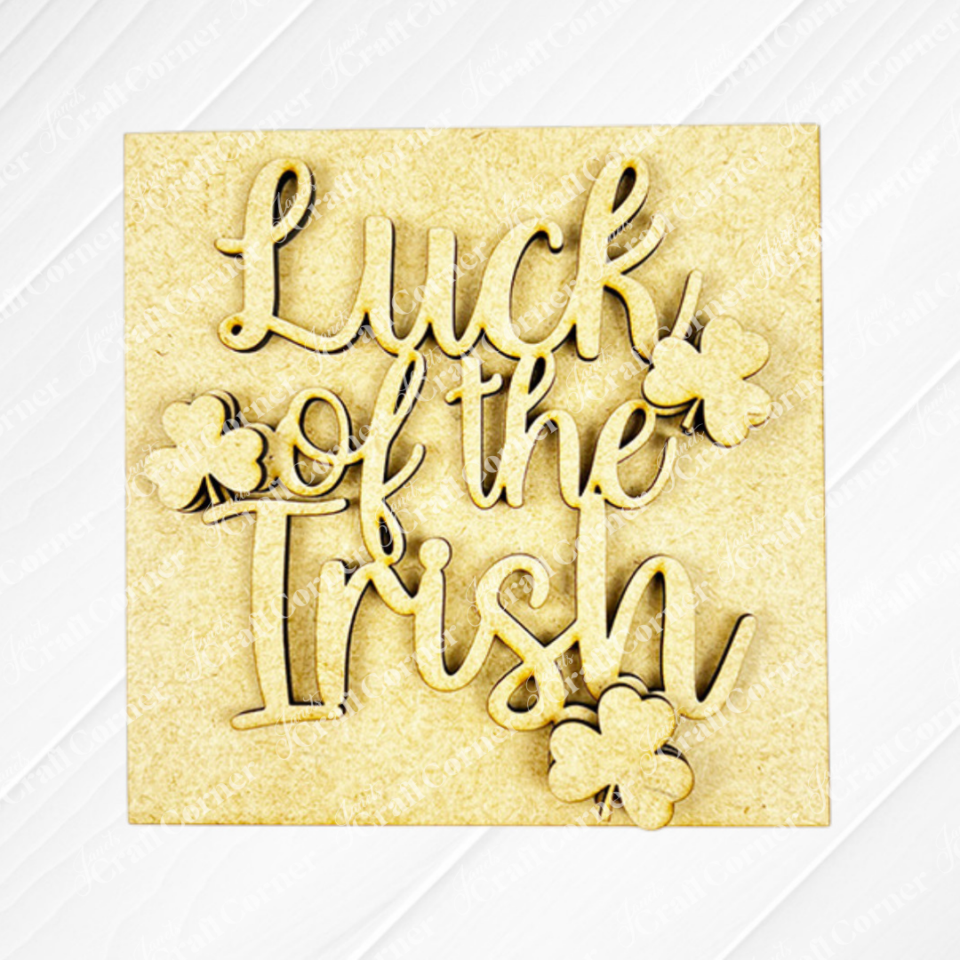The Lucky Irish Squares by Janet's Craft Corner feature "Luck of the Irish" in cursive with three shamrock cut-outs on a light, textured background—perfect for tiered tray decor or Swappable Squares.
