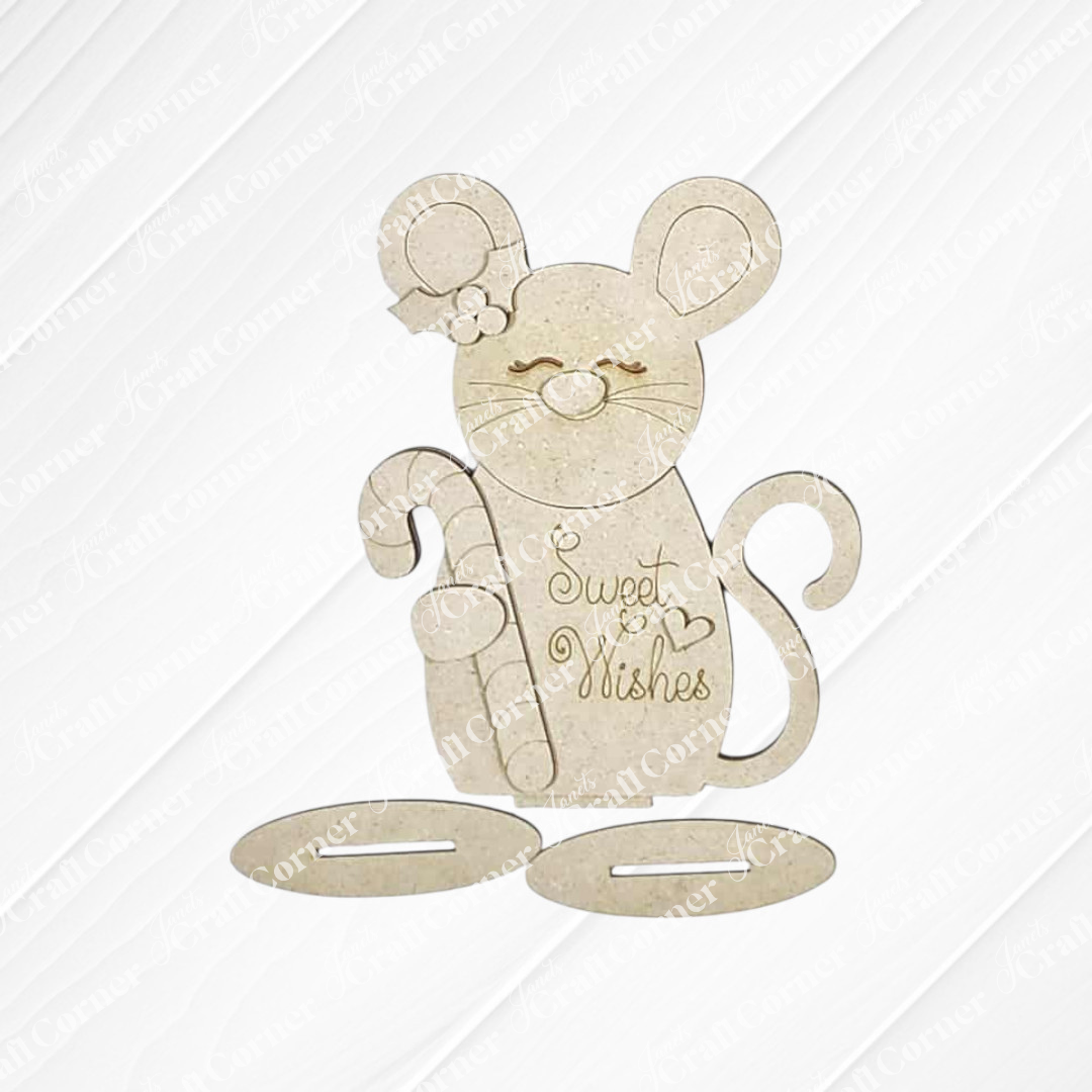 From Janet's Craft Corner, the Forest Friends Shelf Sitters are DIY seasonal home decor kits. This design features a beige cartoon mouse with flower, smiling and holding candy canes, “Sweet Wishes” written on its body—perfect woodland decor.