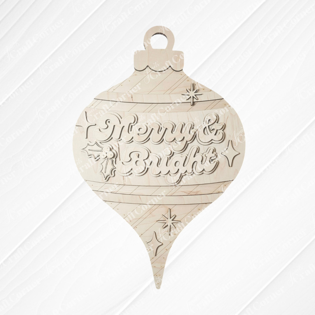 The Merry & Bright Vintage Ornament Door Hanger by Janet's Craft Corner is a DIY holiday craft kit featuring a wooden bauble engraved with “Merry & Bright,” holly leaves, and stars—perfect for adding festive charm to your home.