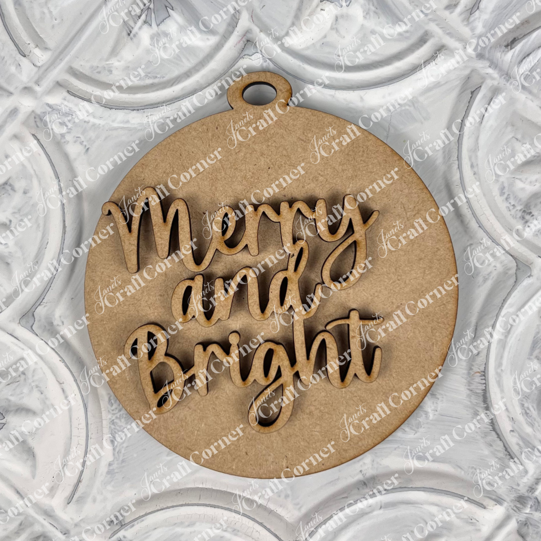 A DIY decoration kit from Janet's Craft Corner titled "Round Christmas Ornaments" rests against a textured white background with circular patterns, adding a touch of charm to your Christmas collection.