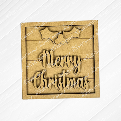 Janet's Craft Corner Merry Christmas Squares: Light wood plaque with "Merry Christmas" in cursive and a holly leaf. Ideal for DIY seasonal decor and fits Swappable Square Displays for simple holiday updates.