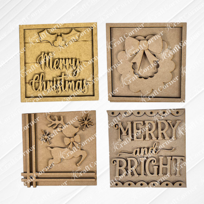 Janet's Craft Corner Merry Christmas Squares features four wooden ornaments: “Merry Christmas” with holly, a bell and bow, a reindeer with stars, and “Merry and Bright”—perfect for DIY holiday décor or swappable displays.