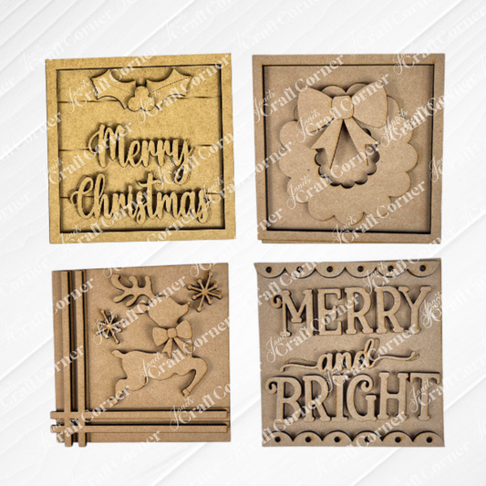 Janet's Craft Corner Merry Christmas Squares features four wooden ornaments: “Merry Christmas” with holly, a bell and bow, a reindeer with stars, and “Merry and Bright”—perfect for DIY holiday décor or swappable displays.