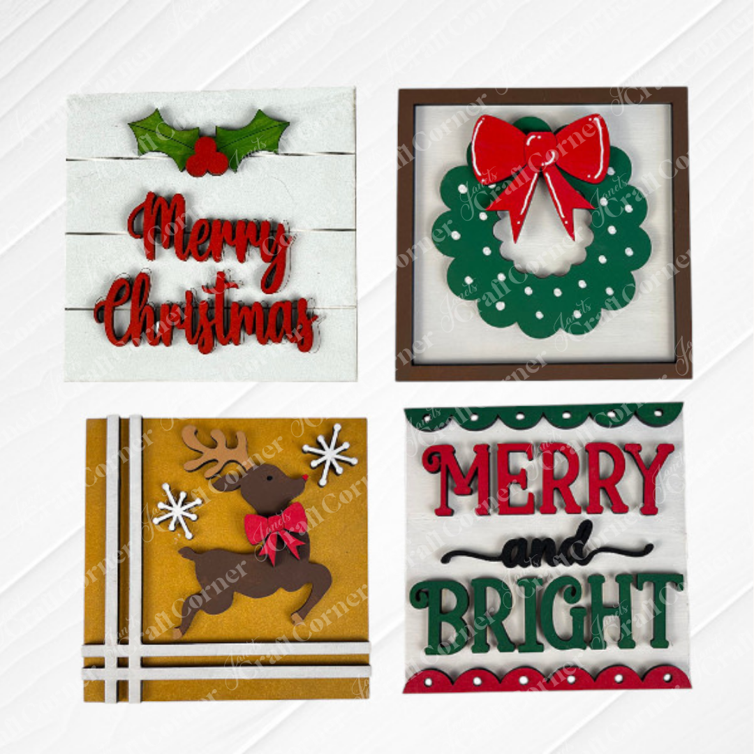 Janet's Craft Corner Merry Christmas Squares include four festive DIY decorations: "Merry Christmas" with holly, a wreath with red bow, a reindeer with ribbon, and "Merry and Bright," perfect for Swappable Square Displays.