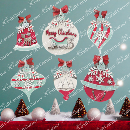 The Mistletoe Ornaments DIY Decor Kit by Janet's Craft Corner includes six festive ornaments with red, white, and light blue designs—perfect for adding charming holiday decor to your tree or holiday display.