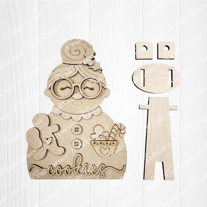 Janet's Craft Corner Mrs. Claus Shelf Sitter is a DIY seasonal home décor craft kit—set of 1—featuring laser-cut wood pieces for a charming holiday display.