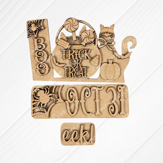 Introducing the Oct 31 Interchangeable Insert DIY home decor kit from Janet's Craft Corner: a delightful set of hand-painted wooden Halloween decorations that look stunning on a white embossed surface. This kit includes carved words such as "Boo," "Oct 31," and "eek," as well as charming figures like a cat, pumpkin, candies, and an interchangeable sign with “Trick or Treat” on a burlap background—ideal for creating personalized and festive decor in your home.