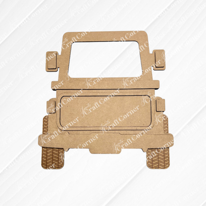 Front view of the Off Road Truck Interchangeable Base by Janet’s Craft Corner—a laser-cut, unfinished wood decor jeep silhouette featuring detailed tire treads and side mirrors—displayed on a white textured background; perfect for seasonal decorating or as part of a DIY home decor craft kit set.