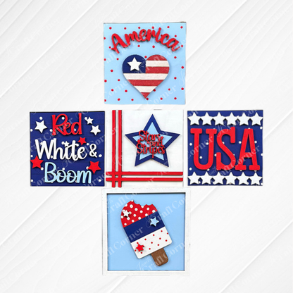 Janet's Craft Corner Patriotic Squares DIY kit includes five square designs—heart with U.S. flag colors and “America,” “Red White & Boom,” star with “Stars and Stripes,” “USA,” and a red, white & blue popsicle—ideal for festive July 4th décor.