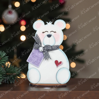Janet's Craft Corner Polar Bear Shelf Sitters DIY kit lets you create cute white bears with pink cheeks, gingham bow, heart detail, and “Merry & Bright” tag—perfect seasonal decor for your home or Christmas crafts. Choice of 2.