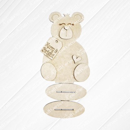 Janet's Craft Corner Polar Bear Shelf Sitters is a DIY seasonal decor kit featuring three oval-shaped pieces with slots to assemble your own festive polar bear, available in two styles. Perfect for holiday decorating!.