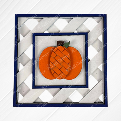 The Pumpkin Spice Squares by Janet's Craft Corner features a white lattice background, orange pumpkin with green leaf, and blue frame—a perfect square wall art for tiered tray decor.