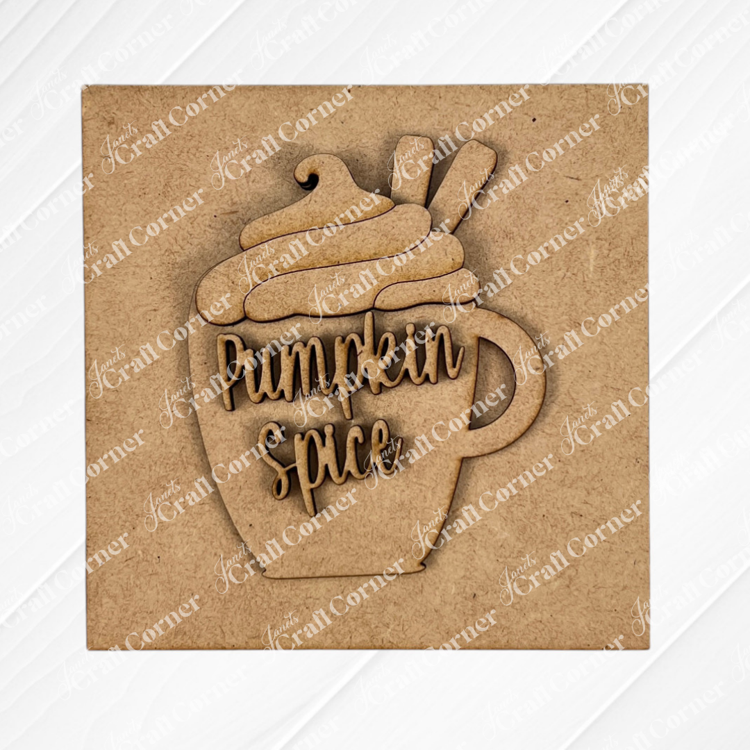 The Pumpkin Spice Squares by Janet's Craft Corner is a wood cut-out featuring a mug with whipped cream and cinnamon sticks, labeled "Pumpkin Spice." Ideal for tiered tray décor or your Swappable Squares collection.