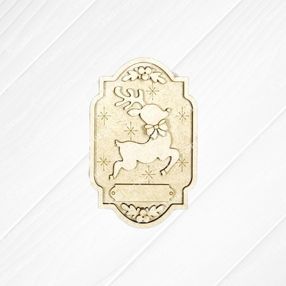 The North Pole Ornaments DIY craft kit by Janet’s Craft Corner includes a decorative plaque with an engraved reindeer, stars, and a blank space for personalization—perfect for holiday home decor projects. Set of 1.