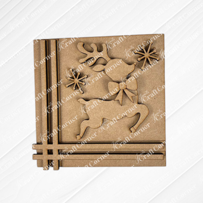 The Merry Christmas Squares by Janet's Craft Corner is a square wooden decoration with a reindeer and bow, two snowflakes, and three lines in the bottom left, ideal for festive DIY seasonal home decor.