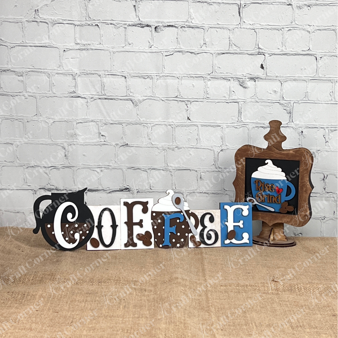 Janet's Craft Corner Coffee Swappable Squares feature decorative wooden letters that spell "COFFEE" with coffee-themed designs, plus a sign with a dark blue mug and "Rise & Grind," creating charming seasonal decor for small spaces.