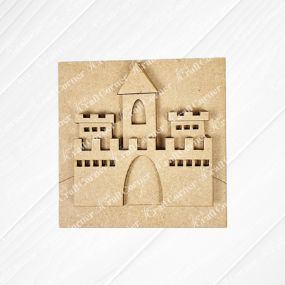 The Summer Beach Squares DIY craft kit by Janet's Craft Corner features a square wooden cutout with a castle design—complete with towers, arched windows, and a central gate—ideal for tiered trays or coffee bar decor, on a white textured background.