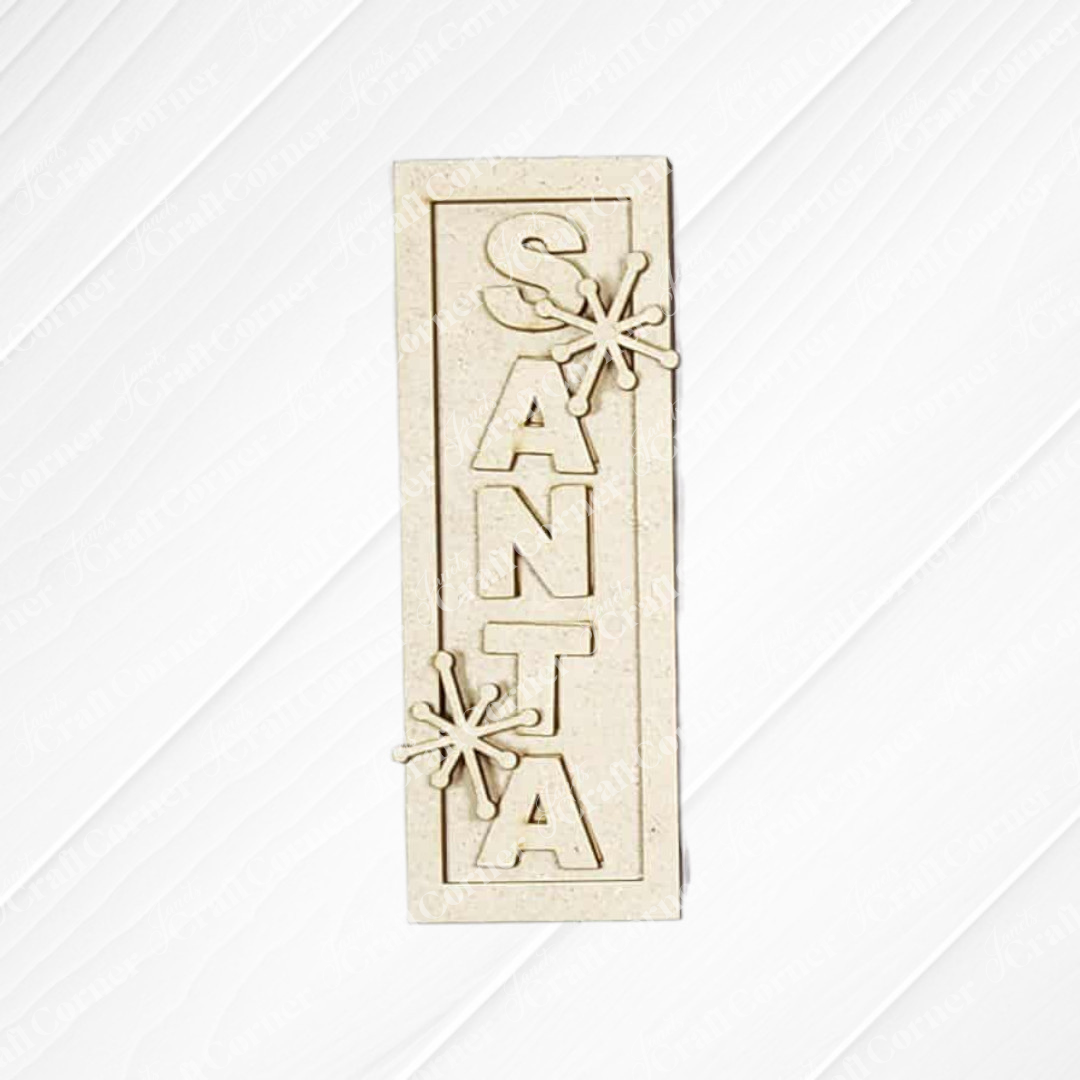 Add festive charm to your home with this rectangular beige plaque from Janet's Craft Corner’s North Pole Decor Set, featuring cutout “SANTA” letters and two starburst shapes—a perfect holiday accent.