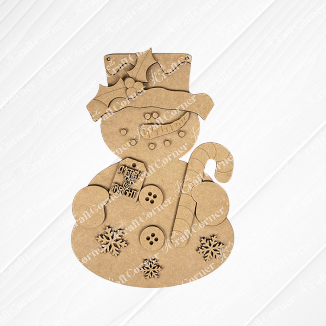 The Candy Cane Snowman Door Hanger from Janet's Craft Corner is a delightful wooden decoration featuring button and snowflake cutouts. Holding a candy cane, it wears a holly-adorned top hat and displays a "Merry & Bright" tag, perfect for holiday decor lovers.