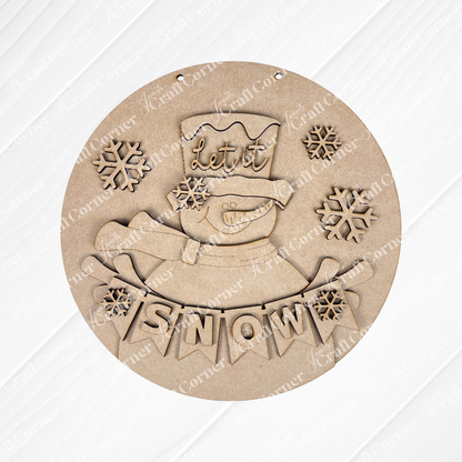 Create charming holiday decor with Janet's Craft Corner's DIY kit: the Snowman Let It Snow Door Hanger, featuring a smiling snowman in a top hat that reads "Let it" and banner saying "SNOW" on burlap, perfect for any seasonal project.