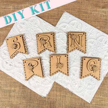 Enhance your home décor with Janet's Craft Corner's Spring Banner DIY Kit. This charming kit includes flag-shaped pieces embellished with delicate flower designs and hole-punched edges for easy assembly. It's the perfect way to celebrate the fresh, vibrant spirit of the season!