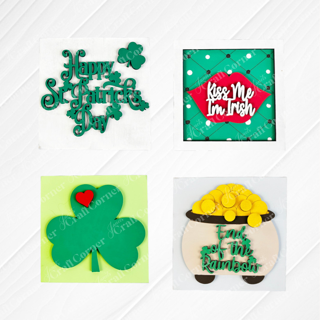 Janet’s Craft Corner’s St Patricks Squares feature four wood-look cookies: "Happy St. Patrick’s Day" with shamrock, "Kiss Me I’m Irish," a heart shamrock, and pot of gold—ideal for tiered trays or as Swappable Squares decor.