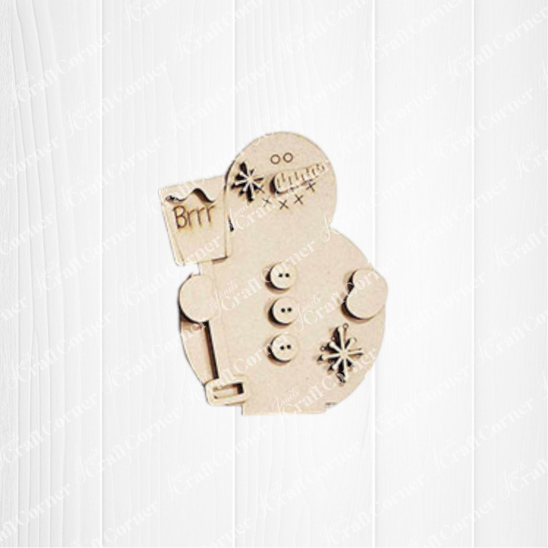 Janet's Craft Corner Snowman Mini Shelf Sitters DIY craft kit features a wooden snowman with button details, a "Brrr" sign, and etched decorations—perfect seasonal decor for your home. Set of 1.