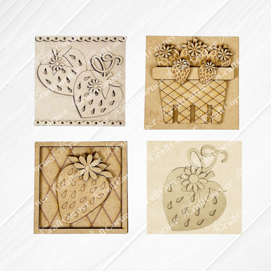 Janet's Craft Corner's Strawberry Swappable Squares DIY kit includes four square wooden panels, each engraved with artistic strawberries, flowers, and baskets—ideal as seasonal tiered tray decor or charming wood cut-outs.
