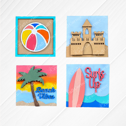 Janet's Craft Corner’s Summer Beach Squares DIY kit features four beachy designs—beach ball, sandcastle, palm tree with "Beach Vibes," and surfboards with "Surf's Up"—perfect for small space decor or tiered tray signs.