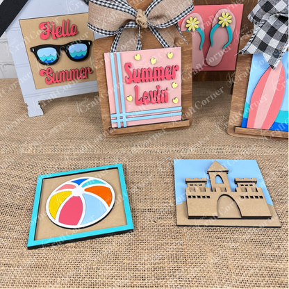Create cheerful summer vibes with Janet's Craft Corner Summer Beach Squares DIY kit! Features wooden plaques on burlap with "Hello Summer," "Summer Lovin'," plus beach ball and sandcastle 3D designs—perfect for coffee bars or small spaces.