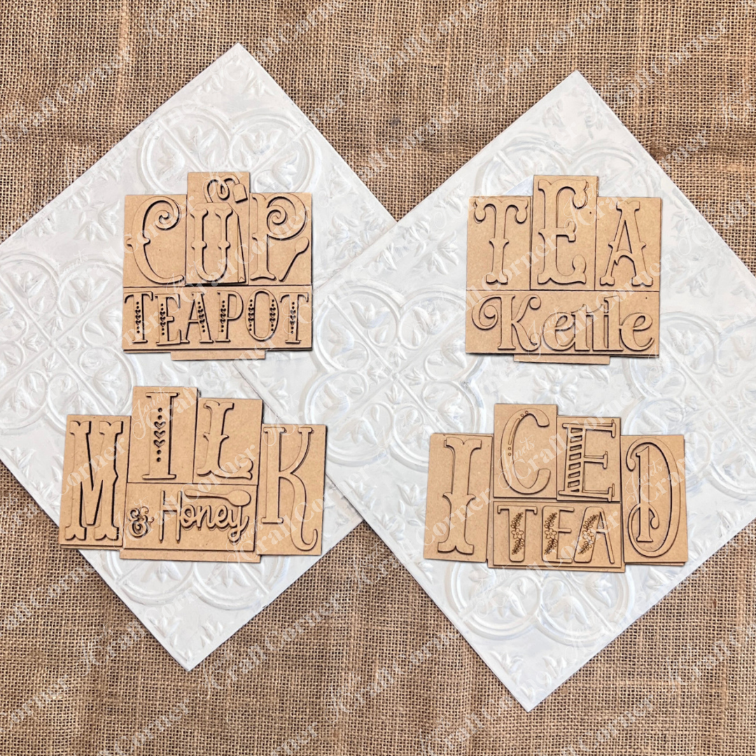 Tea mini word block wood cut-out DIY craft kits by Janet's Craft Corner. 4 signs shown including cup teapot, tea kettle, milk & honey and iced tea.
