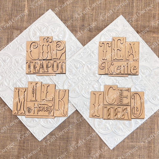 Tea mini word block wood cut-out DIY craft kits by Janet's Craft Corner. 4 signs shown including cup teapot, tea kettle, milk & honey and iced tea.