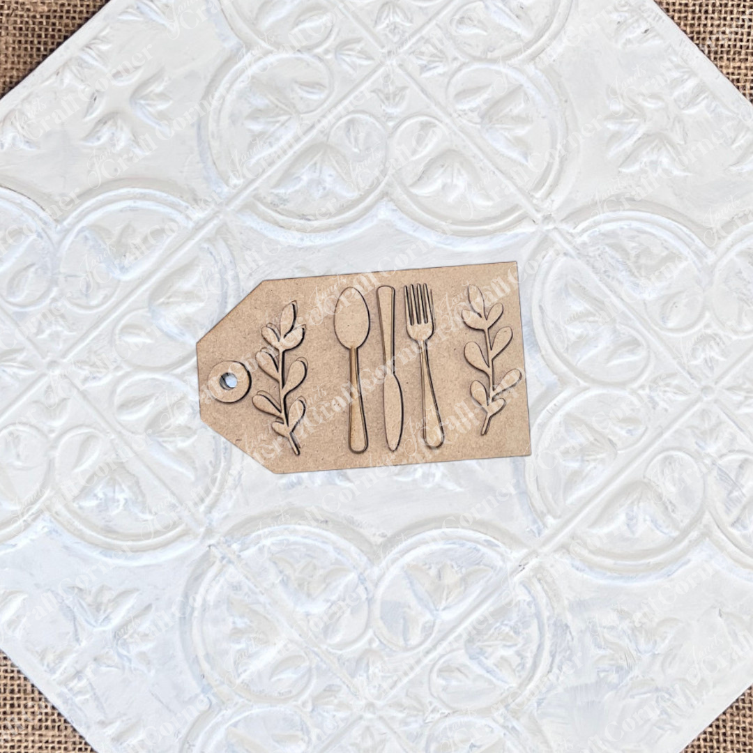 Add a touch of Thankful Decor Set style with Janet's Craft Corner Thankful Mini Shelf Sitters, a DIY seasonal home decor kit featuring brown kraft paper tags with utensil cutouts, perfect for personalized decorations. Set of 1.