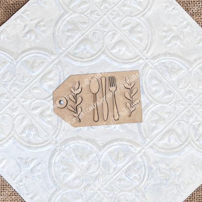 Add a touch of Thankful Decor Set style with Janet's Craft Corner Thankful Mini Shelf Sitters, a DIY seasonal home decor kit featuring brown kraft paper tags with utensil cutouts, perfect for personalized decorations. Set of 1.