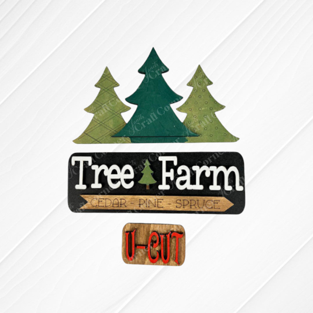 The "Tree Farm Interchangeable Insert" from Janet's Craft Corner is a delightful DIY home decor kit that includes three wooden tree cutouts in different shades of green. The sign displays the words "Cedar - Pine - Spruce," along with a smaller, eye-catching red-lettered sign stating "U-CUT," making it an ideal choice for holiday decorating.