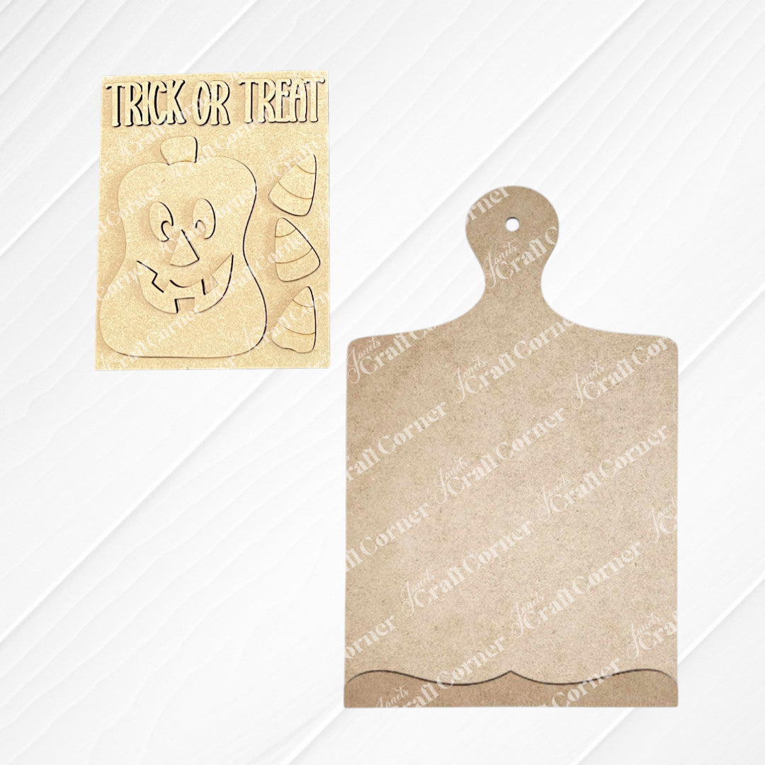 Add a touch of farmhouse charm to your unfinished wood craft kit projects with Janet’s Craft Corner’s “Trick or Treat Pumpkin Farmhouse Sign & Breadboard Sign Holder Class”—a laser-cut wooden sign featuring a pumpkin face and candy corn, displayed alongside a rustic breadboard sign holder on a white wood background.
