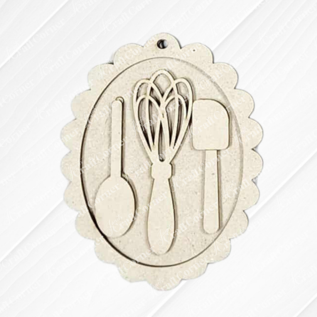 Janet's Craft Corner’s Christmas Baking Ornaments DIY craft kit (choice of 5) features scalloped oval wooden ornaments with spoon, whisk, and spatula cutouts—ideal for festive holiday décor or Christmas crafts.