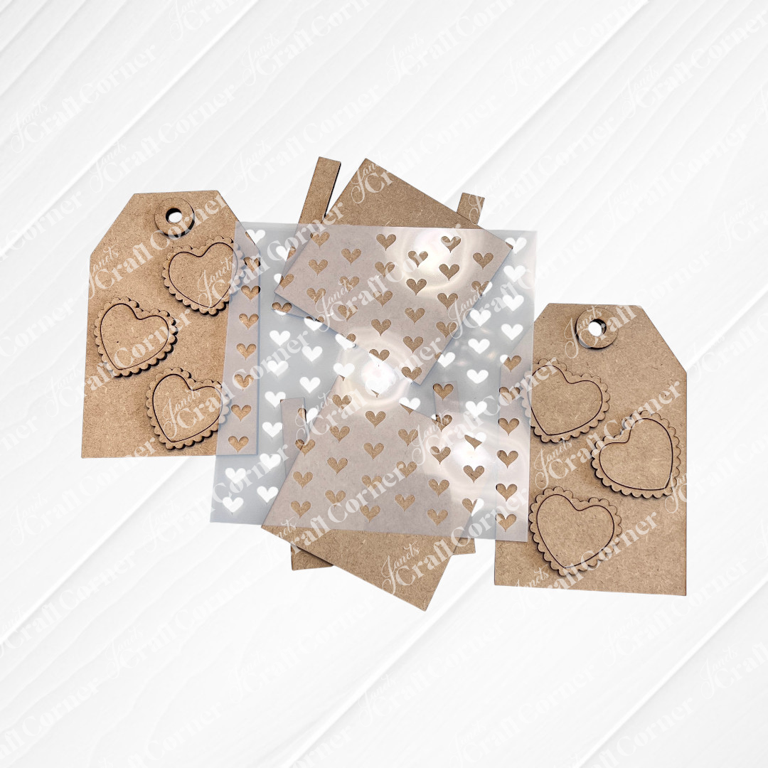 Janet's Craft Corner Valentine Gift Card Tags—DIY seasonal home decor craft kit (Set of 2)—feature scalloped heart cutouts and a plastic stencil, ideal for handmade keepsakes on a white textured background.