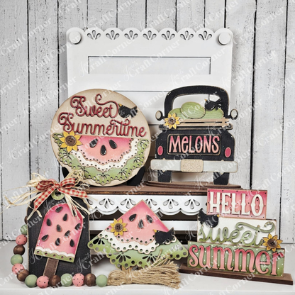 The Vintage Watermelon Decor Set by Janet's Craft Corner features summer-themed wooden cut-outs—watermelons, popsicles, a black truck with melons, and cheerful signs—perfect for charming DIY home decor displays.