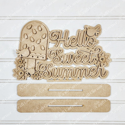 The Vintage Watermelon Word Art Shelf Sitter by Janet's Craft Corner is perfect for home decor or DIY crafting. This laser-cut sign features slotted pieces for easy assembly and looks stylish against a white wood paneling background.