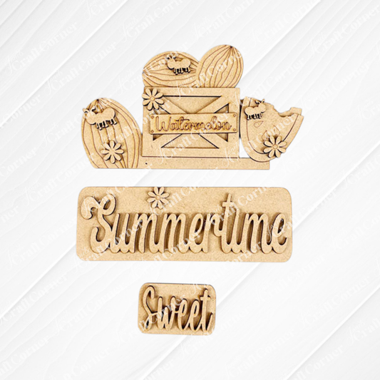 Wooden accents on a textured backdrop: featuring a "Summertime" sign with a sun, a "Sweet" sign, and a crate marked "Watermelon," complete with decorated slices and flowers from the Summertime Watermelon Interchangeable Insert by Janet's Craft Corner—a perfect blend of farmhouse style for your hand-painted DIY home decor kit.