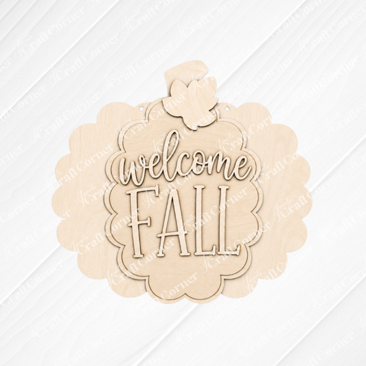Add a touch of autumn to your space with the Welcome Fall Pumpkin Wall Hanger - DIY home decor craft kit from Janet’s Craft Corner. This set features an unfinished wooden pumpkin-shaped sign with layered cutout text reading “welcome FALL” in elegant cursive and bold letters, ready for you to customize and display against any backdrop for charming seasonal style.
