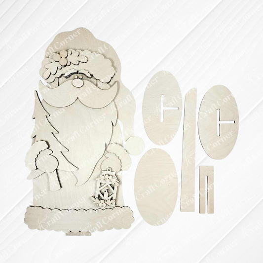 Janet's Craft Corner Woodland Santa Shelf Sitter DIY kit includes laser-cut wooden pieces to create a Santa with tree and lantern, plus slotted ovals and rectangles—ideal for festive seasonal home décor. Set of 1.
