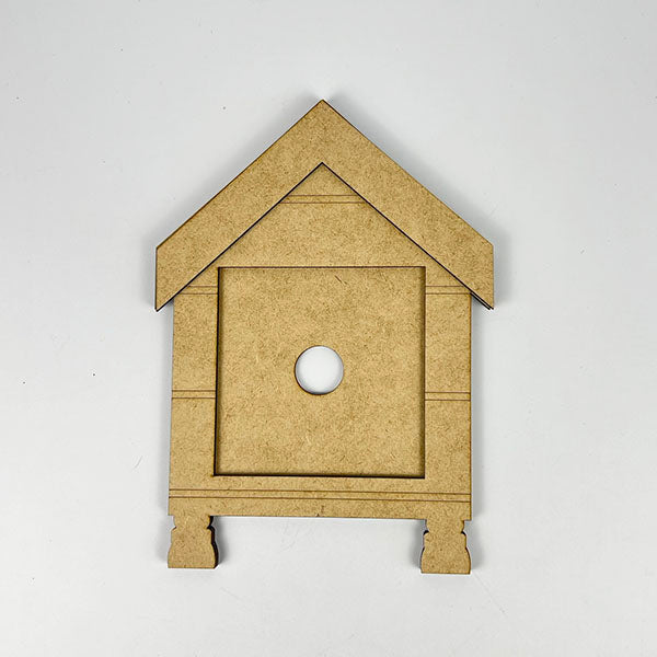 Janet's Craft Corner presents the House Interchangeable Squares Holders, a delightful wooden birdhouse cutout featuring a triangular roof and circular opening, perfect for enhancing your farmhouse décor. This seasonal craft kit is ideal for creative DIY enthusiasts eager to transform any plain backdrop into something extraordinary.